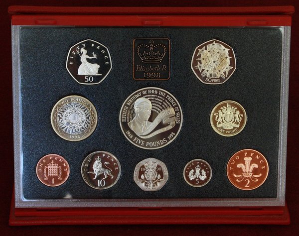 1998 Proof Set.<br />The 50p coin at the top right was to commemorate 25 years of EU membership.<br />The £5 coin (centre) was to commemorate the Prince of Wales' 50th birthday.